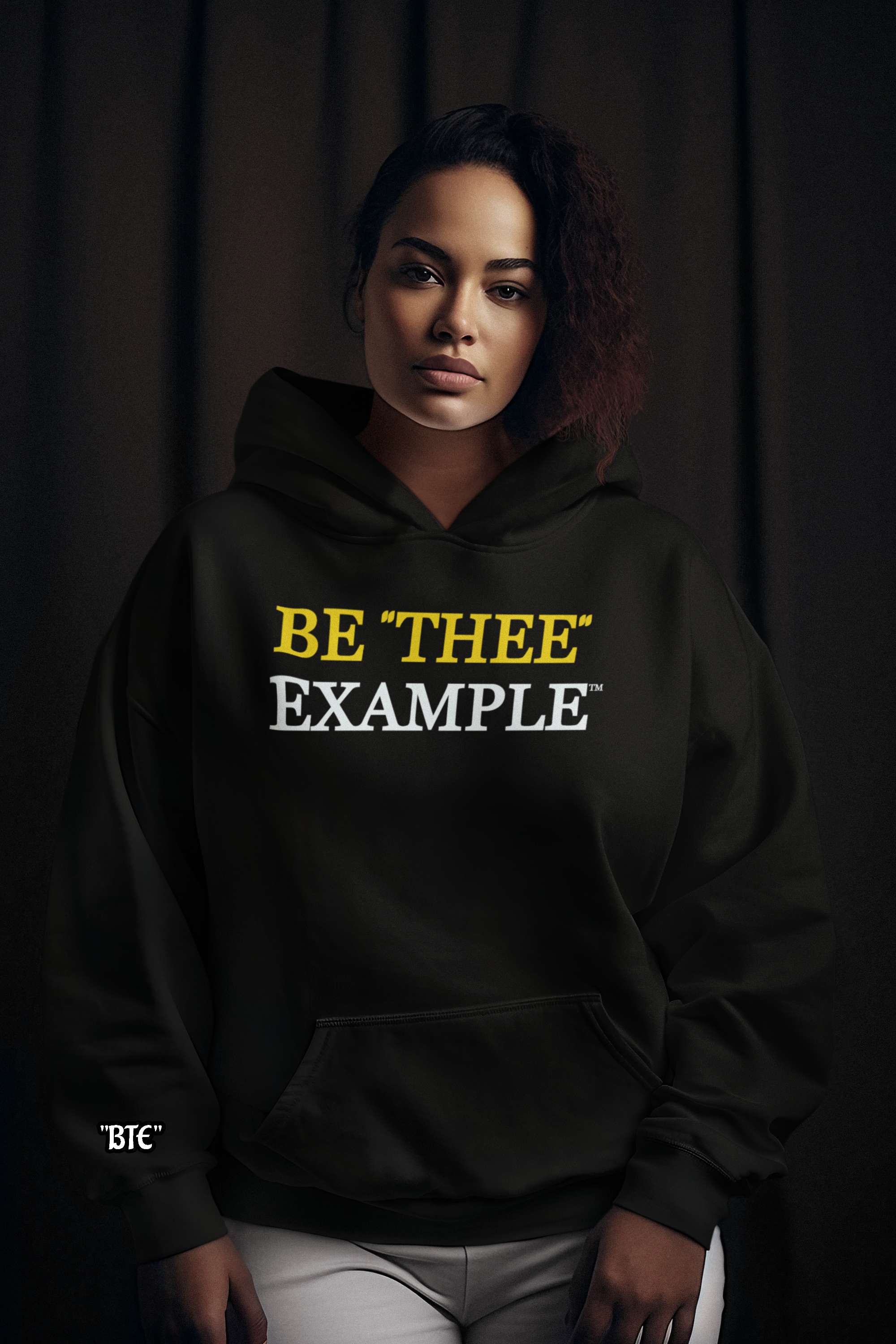 Winged Lion logo with golden heart and BTE initials for BE "THEE" EXAMPLE brand